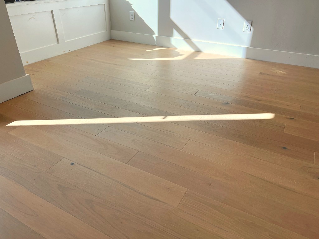 Wide-plank European oak hardwood gluedown sold and installed in Raleigh, NC by CRG Flooring
